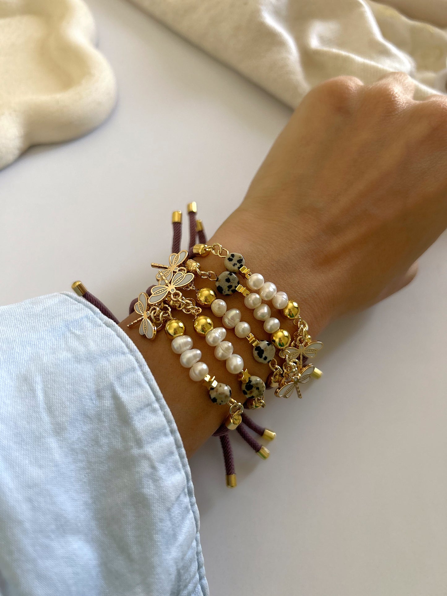 Pearls bracelet with butterfly charm