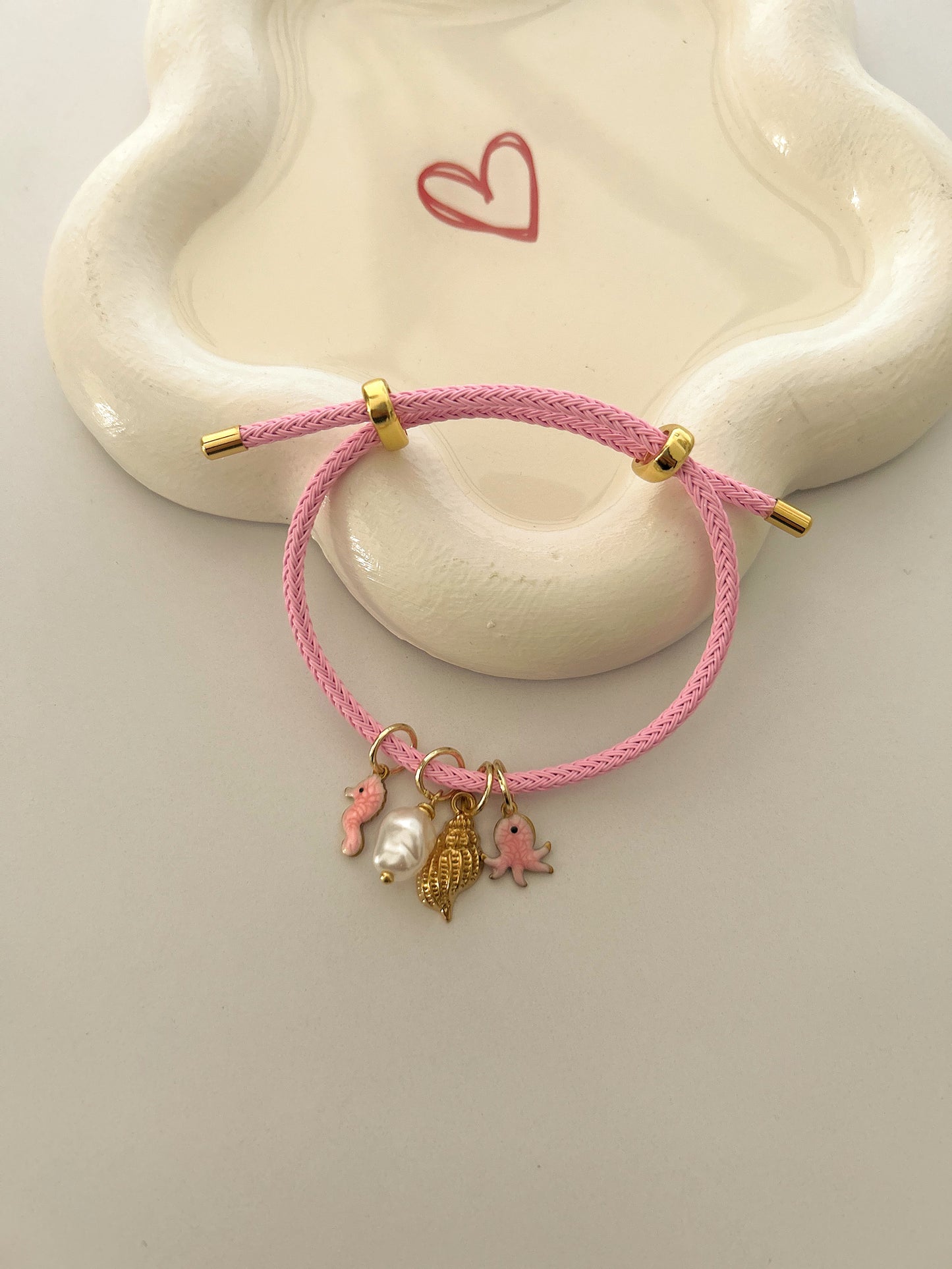 Pink charms bracelet