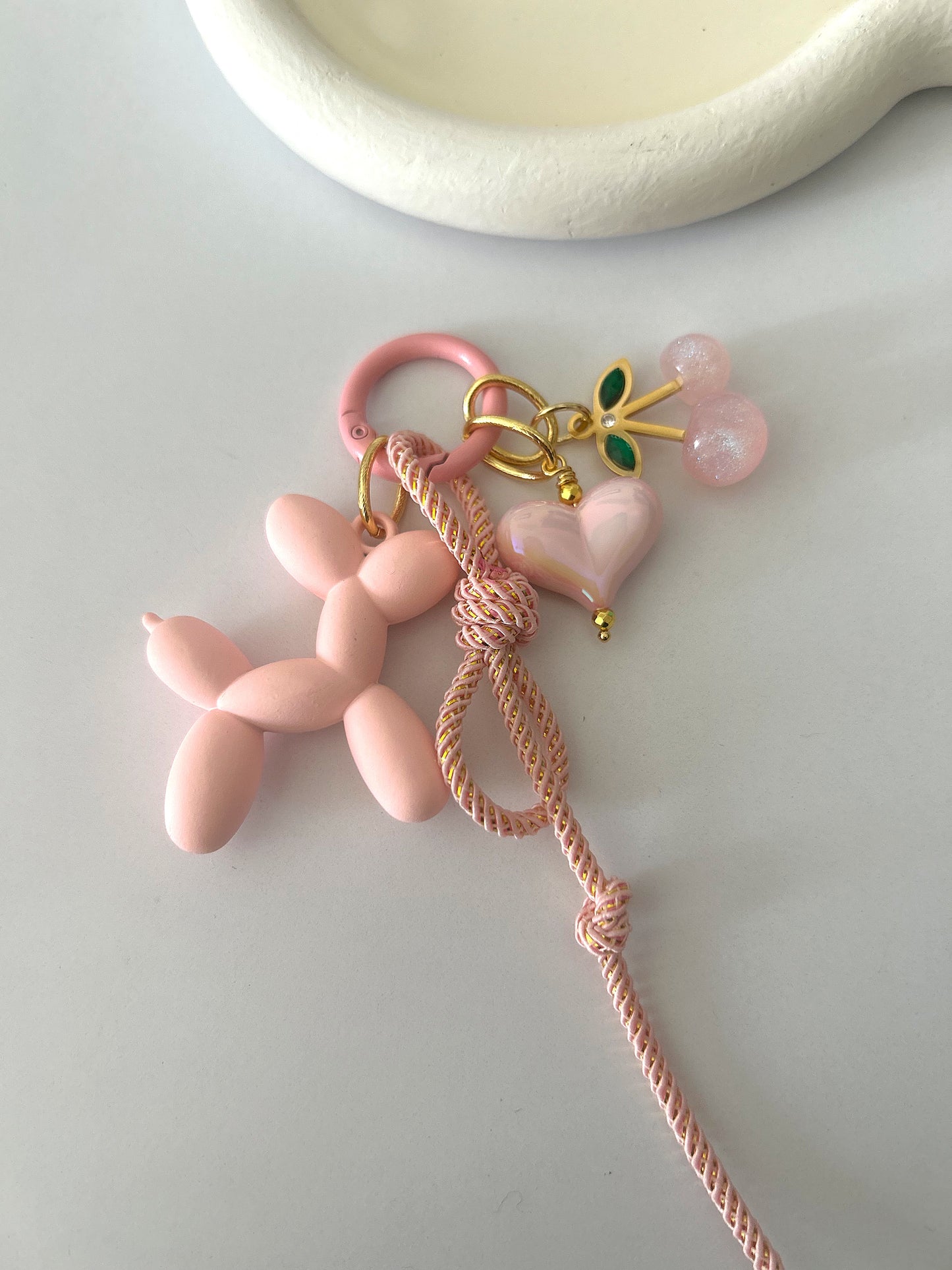 Pink chain with pink cherry