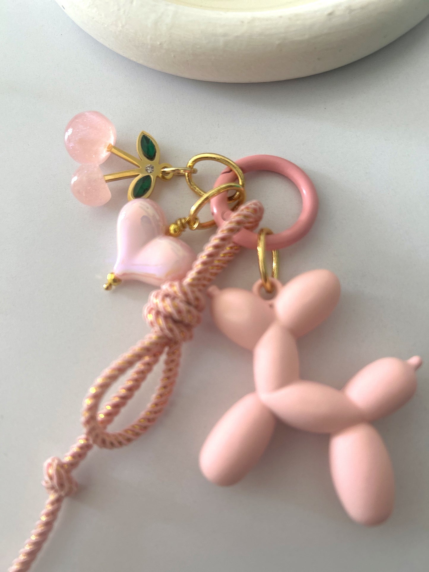 Pink chain with pink cherry