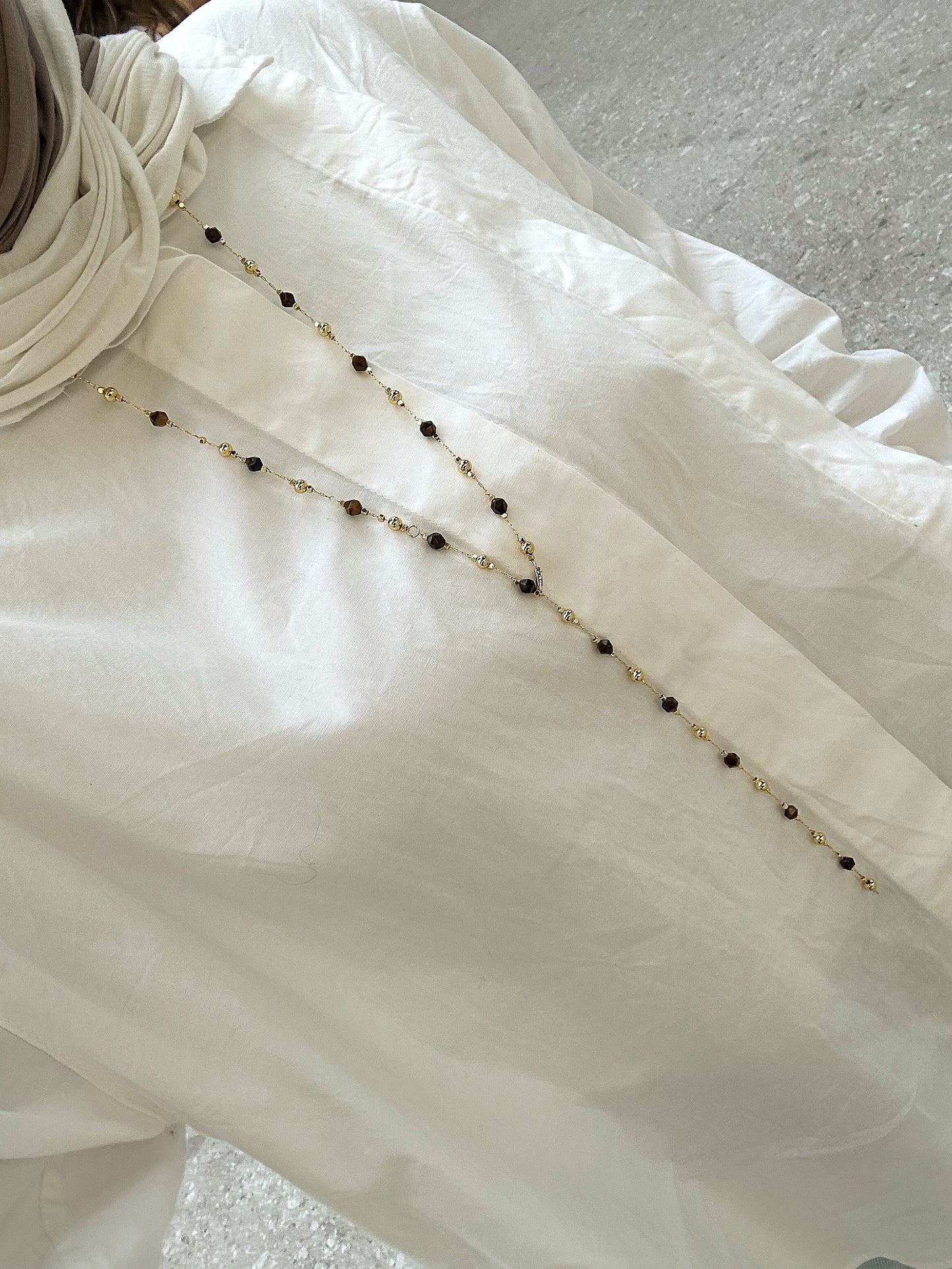 Long necklace with brown stones
