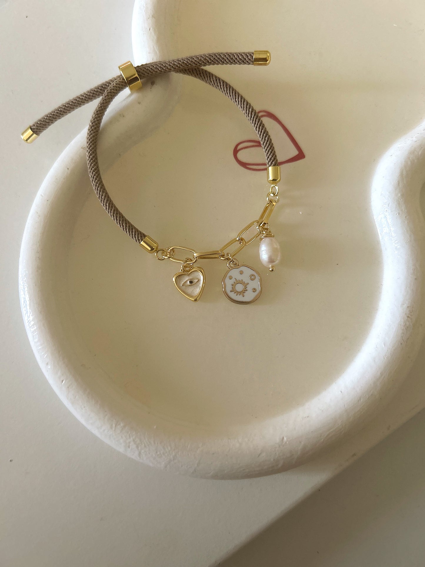 Nude charms bracelet
