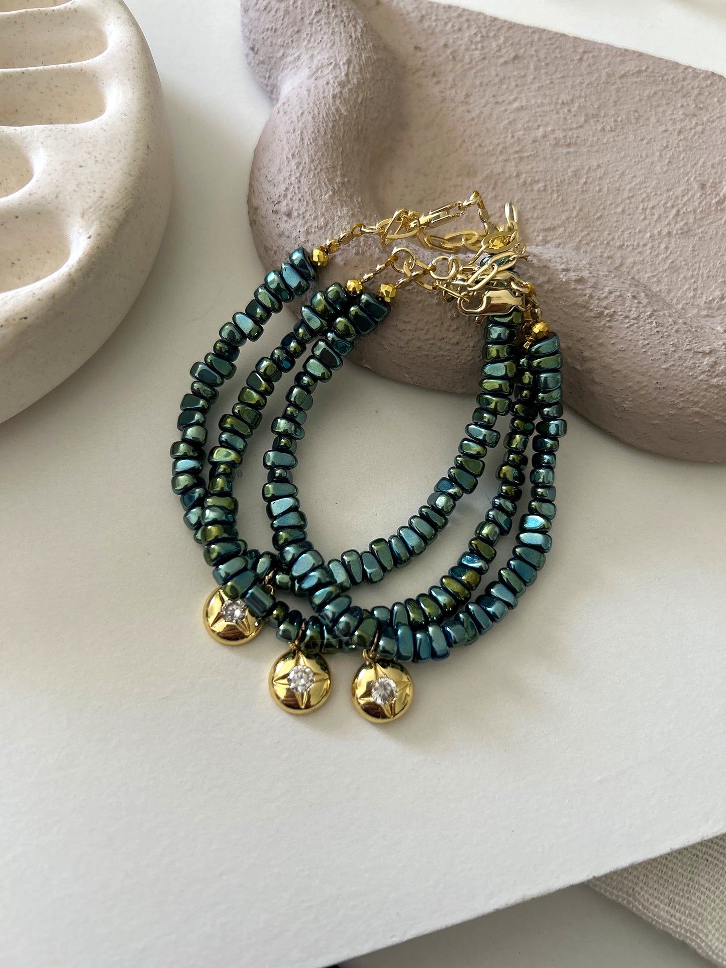 Green stone bracelet (golden charm)