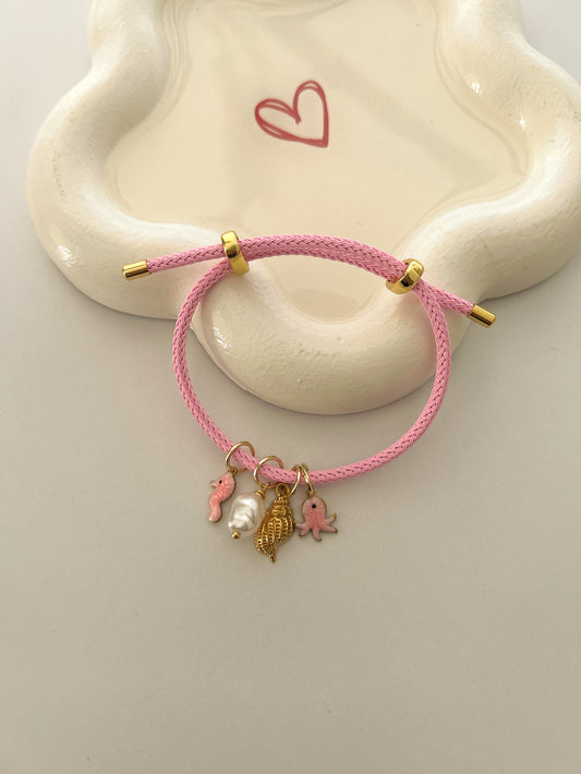 Pink charms bracelet