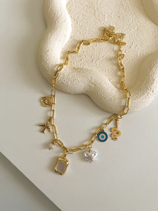 Charms necklace with evil eye