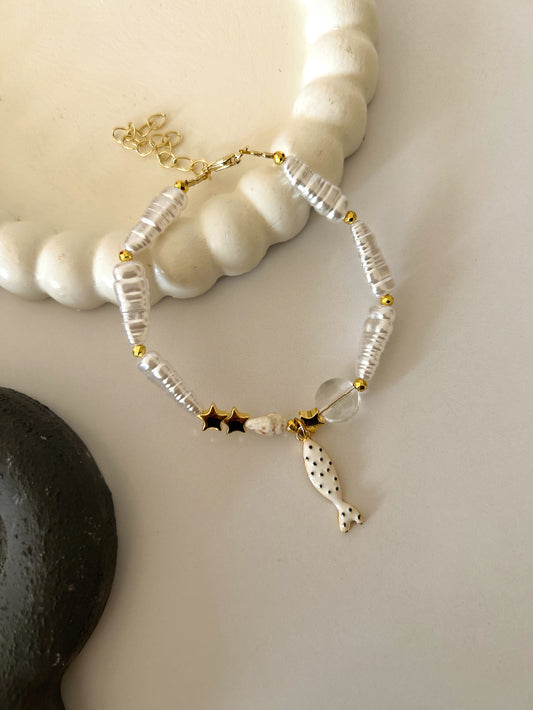 Peals with fish bracelet